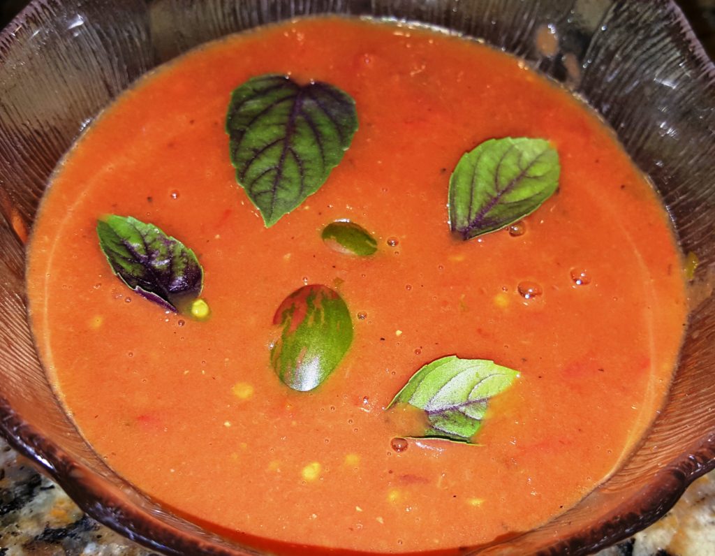 Tomato Basil Soup garnished with Purple Basil and Lucky Tiger Tomatoes